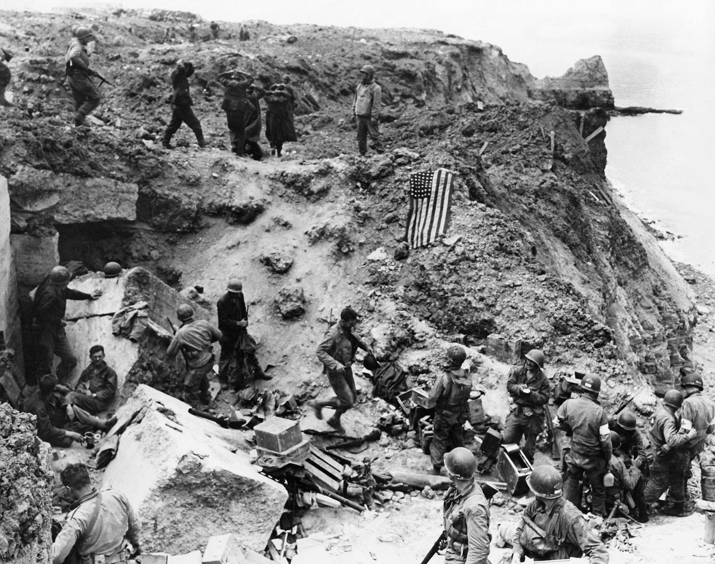 Allied forces have taken a German coastal battery at Pointe de Hoc west of Omaha Beach