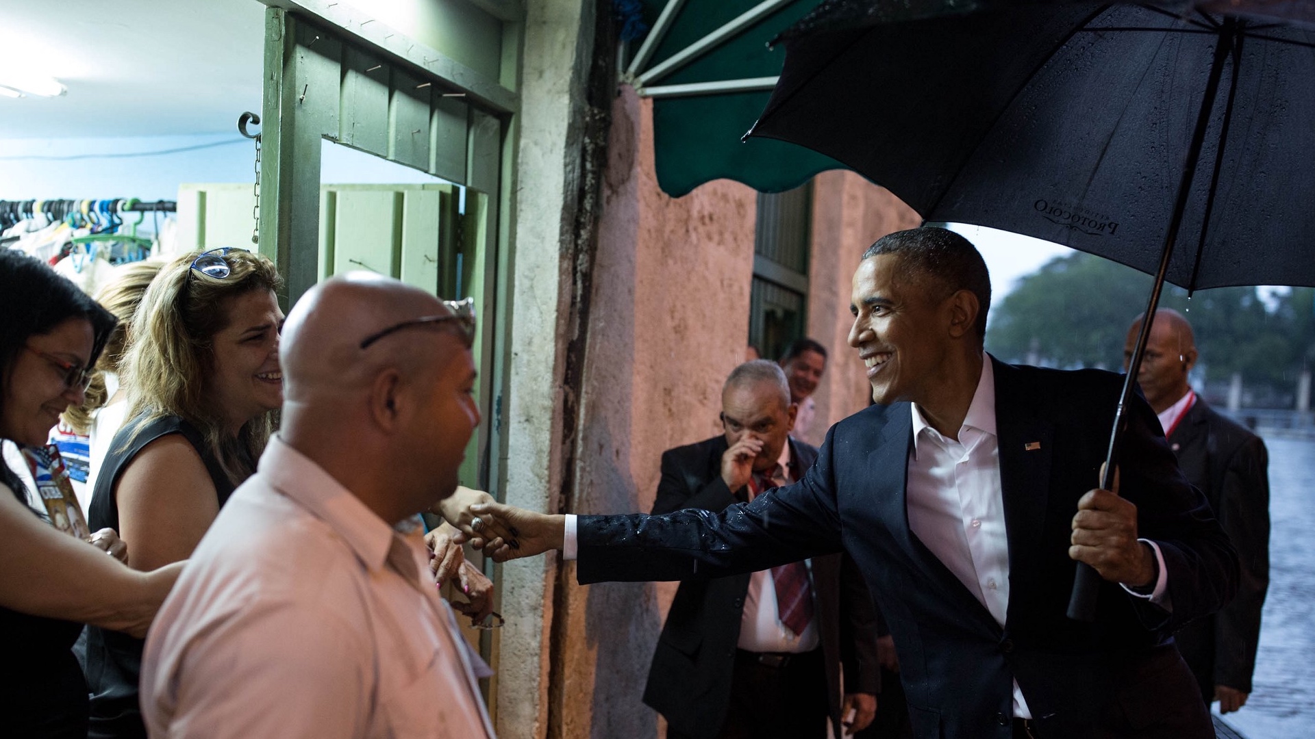 President Obama greets Cubans